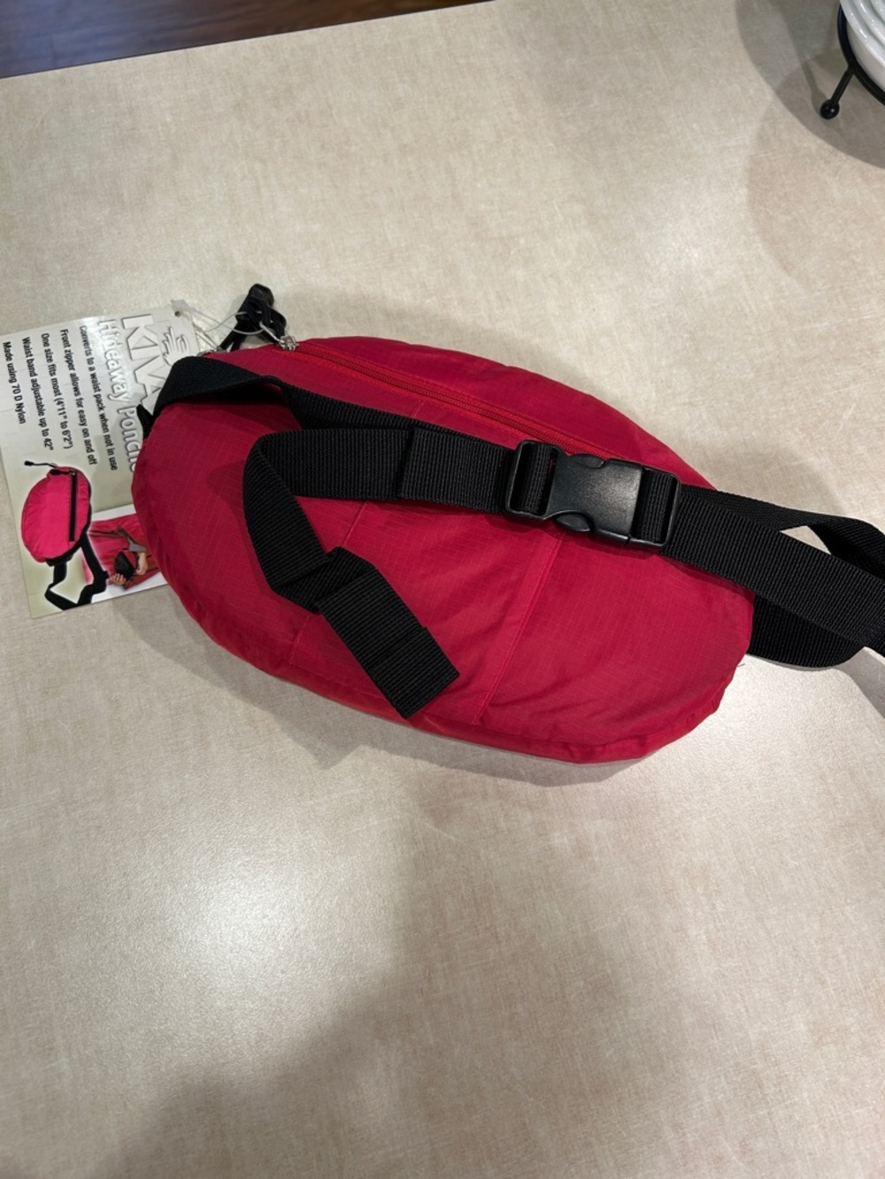 KIVA hideaway poncho in a light weight waist pack. Great for outdoor activities